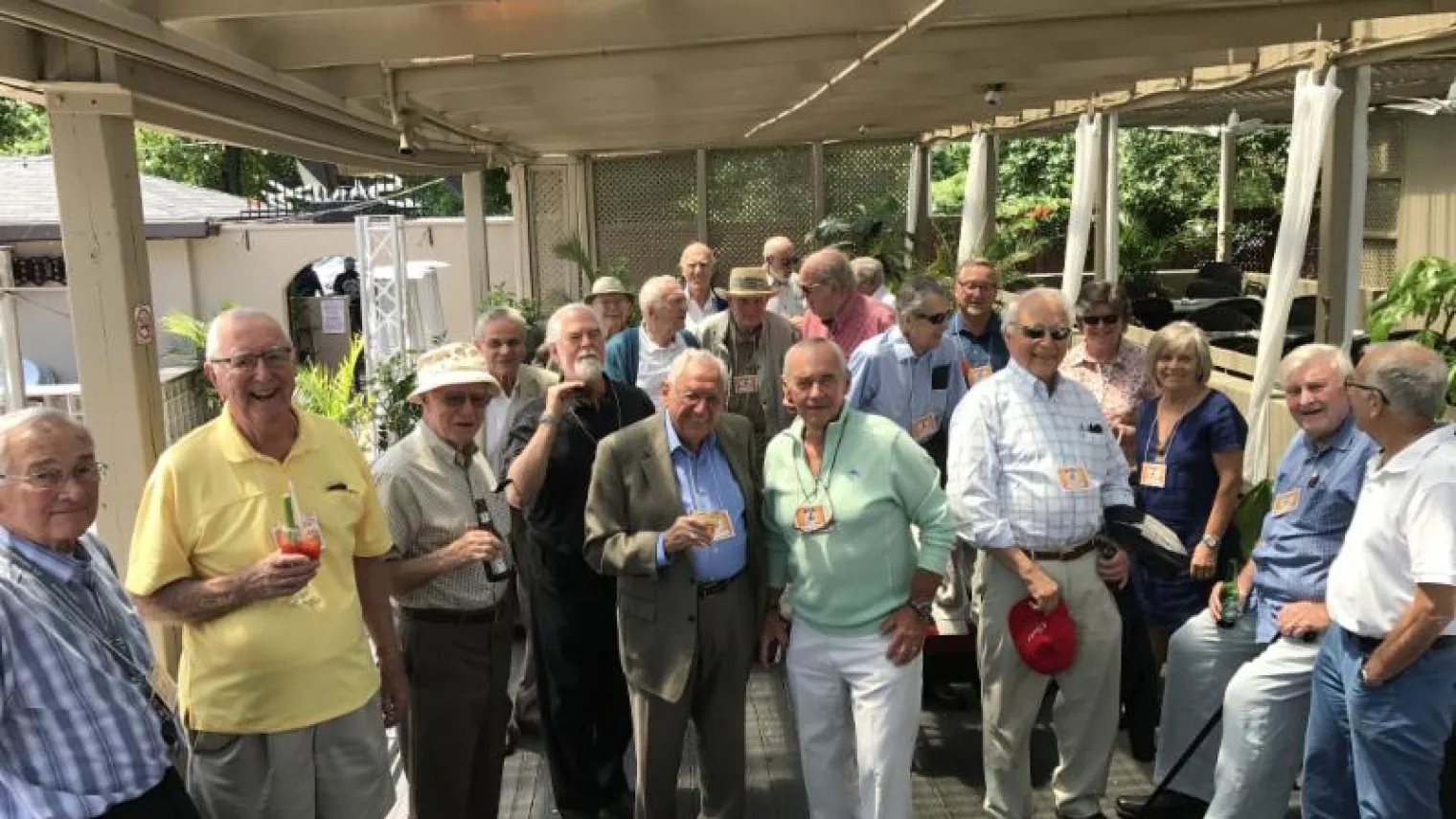 Retired physicians gathered on a covered patio for a RODEO lunch